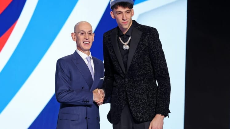 Jun 23, 2022; Brooklyn, NY, USA; Chet Holmgren (Gonzaga) shakes hands with NBA commissioner Adam Silver after being selected as the number two overall pick by the Oklahoma City Thunder in the first round of the 2022 NBA Draft at Barclays Center. Mandatory Credit: Brad Penner-USA TODAY Sports