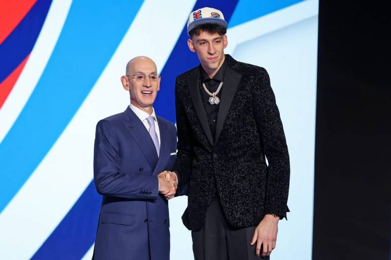 Jun 23, 2022; Brooklyn, NY, USA; Chet Holmgren (Gonzaga) shakes hands with NBA commissioner Adam Silver after being selected as the number two overall pick by the Oklahoma City Thunder in the first round of the 2022 NBA Draft at Barclays Center. Mandatory Credit: Brad Penner-USA TODAY Sports
