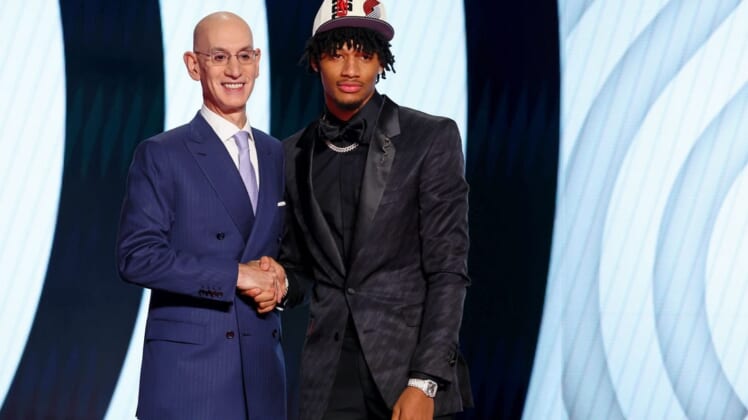 Jun 23, 2022; Brooklyn, NY, USA; Shaedon Sharpe (Kentucky) shakes hands with NBA commissioner Adam Silver after being selected as the number seven overall pick by the Portland Trail Blazers in the first round of the 2022 NBA Draft at Barclays Center. Mandatory Credit: Brad Penner-USA TODAY Sports