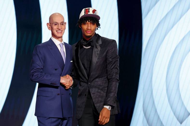 Jun 23, 2022; Brooklyn, NY, USA; Shaedon Sharpe (Kentucky) shakes hands with NBA commissioner Adam Silver after being selected as the number seven overall pick by the Portland Trail Blazers in the first round of the 2022 NBA Draft at Barclays Center. Mandatory Credit: Brad Penner-USA TODAY Sports