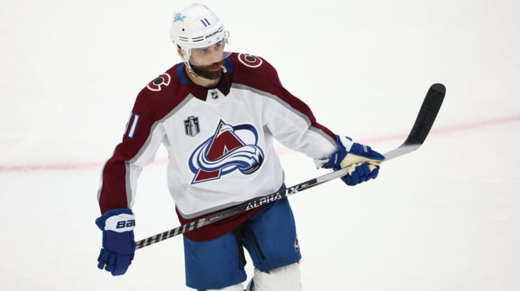 Jun 20, 2022; Tampa, Florida, USA; Colorado Avalanche center Andrew Cogliano (11) against the Tampa Bay Lightning during game three of the 2022 Stanley Cup Final at Amalie Arena. Mandatory Credit: Mark J. Rebilas-USA TODAY Sports