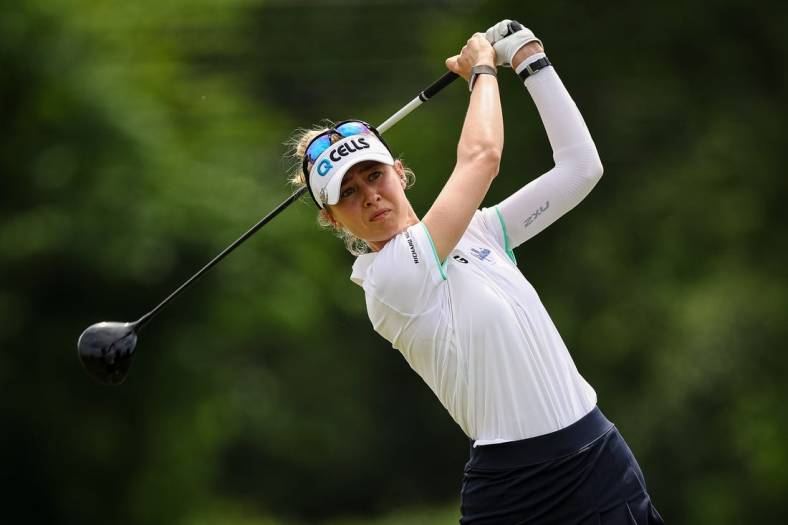 Jun 24, 2022; Bethesda, Maryland, USA; Nelly Korda plays her shot from the 18th tee during the second round of the KPMG Women's PGA Championship golf tournament at Congressional Country Club. Mandatory Credit: Scott Taetsch-USA TODAY Sports