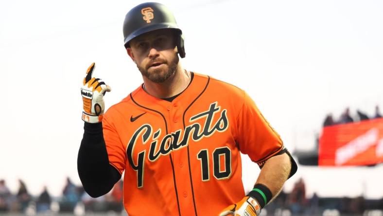 Jun 24, 2022; San Francisco, California, USA; San Francisco Giants third baseman Evan Longoria (10) gestures after hitting a home run against the Cincinnati Reds during the fourth inning at Oracle Park. Mandatory Credit: Kelley L Cox-USA TODAY Sports