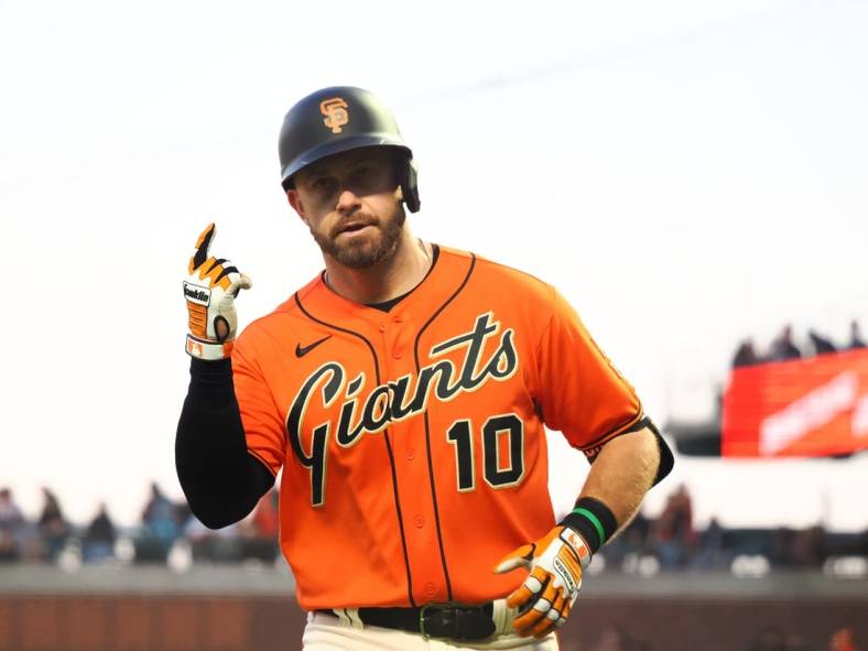 Jun 24, 2022; San Francisco, California, USA; San Francisco Giants third baseman Evan Longoria (10) gestures after hitting a home run against the Cincinnati Reds during the fourth inning at Oracle Park. Mandatory Credit: Kelley L Cox-USA TODAY Sports
