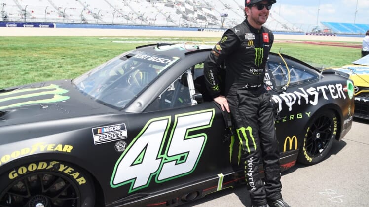 Jun 25, 2022; Nashville, Tennessee, USA; NASCAR Cup Series driver Kurt Busch (45) stands at his car during qualifying for the Ally 400 at Nashville Superspeedway. Mandatory Credit: Christopher Hanewinckel-USA TODAY Sports