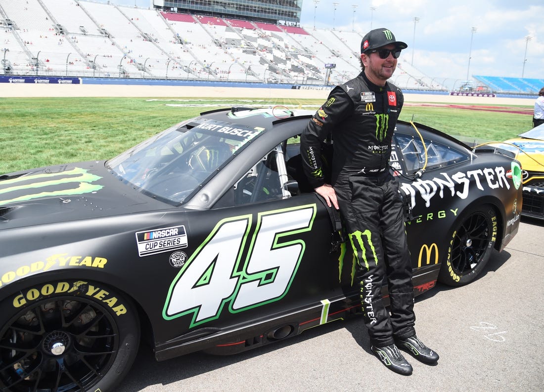 Jun 25, 2022; Nashville, Tennessee, USA; NASCAR Cup Series driver Kurt Busch (45) stands at his car during qualifying for the Ally 400 at Nashville Superspeedway. Mandatory Credit: Christopher Hanewinckel-USA TODAY Sports