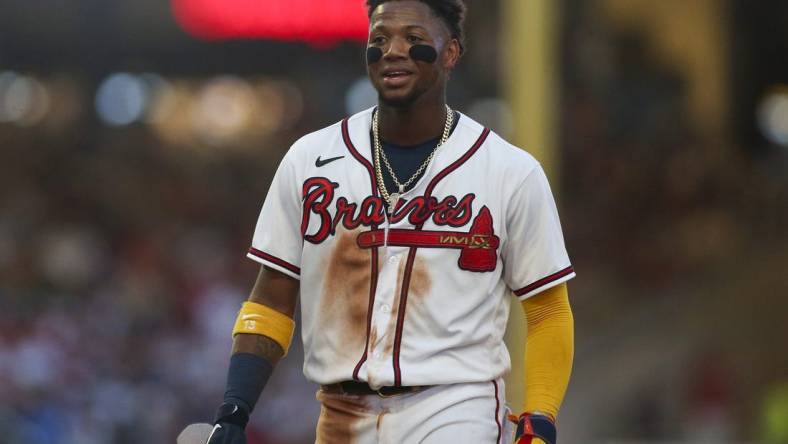 Jun 25, 2022; Atlanta, Georgia, USA; Atlanta Braves right fielder Ronald Acuna Jr. (13) reacts during the fifth inning against the Los Angeles Dodgers at Truist Park. Mandatory Credit: Brett Davis-USA TODAY Sports