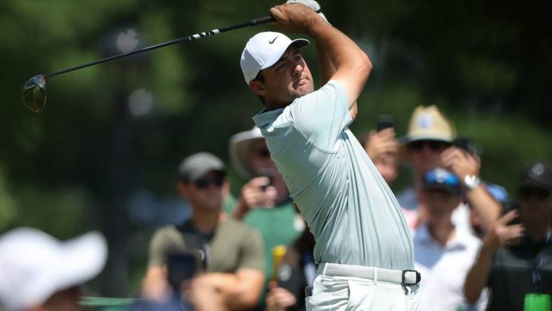 Jun 26, 2022; Cromwell, Connecticut, USA; Scottie Scheffler plays a shot from the first tee during the final round of the Travelers Championship golf tournament. Mandatory Credit: Vincent Carchietta-USA TODAY Sports