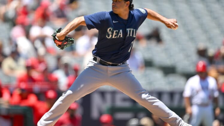 Jun 26, 2022; Anaheim, California, USA;  Seattle Mariners starting pitcher Marco Gonzales (7) in the first inning against the Los Angeles Angels at Angel Stadium. Mandatory Credit: Jayne Kamin-Oncea-USA TODAY Sports