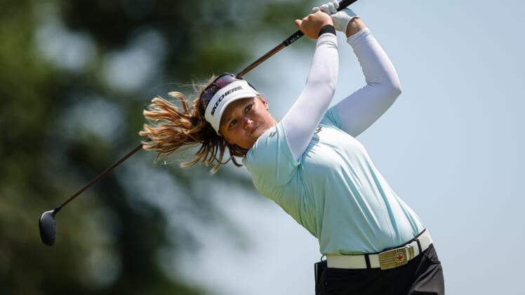 Jun 26, 2022; Bethesda, Maryland, USA; Brooke Henderson plays her shot from the 15th tee during the final round of the KPMG Women's PGA Championship golf tournament at Congressional Country Club. Mandatory Credit: Scott Taetsch-USA TODAY Sports