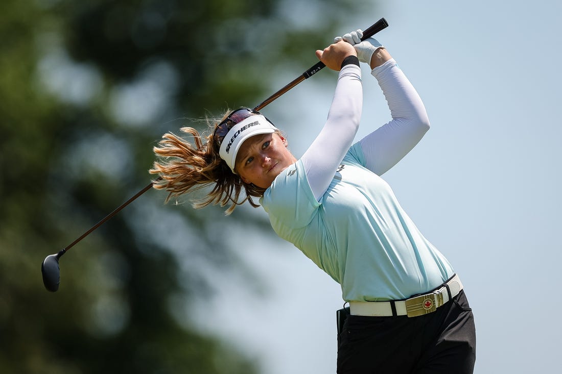 Jun 26, 2022; Bethesda, Maryland, USA; Brooke Henderson plays her shot from the 15th tee during the final round of the KPMG Women's PGA Championship golf tournament at Congressional Country Club. Mandatory Credit: Scott Taetsch-USA TODAY Sports