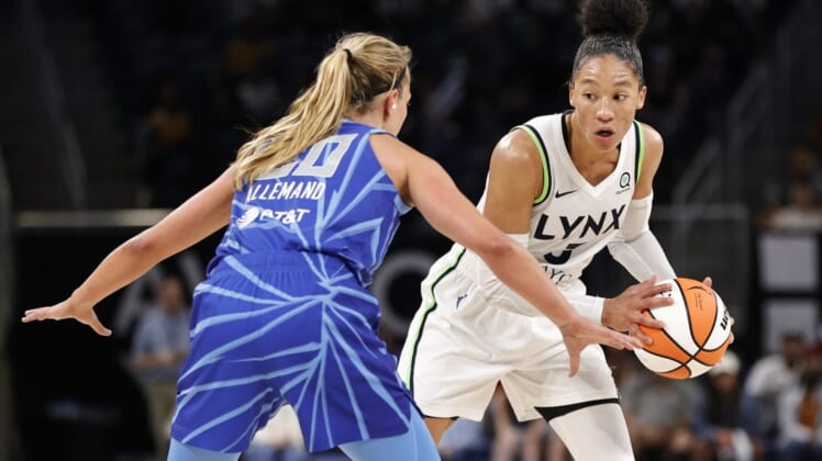 Jun 26, 2022; Chicago, Illinois, USA; Minnesota Lynx forward Aerial Powers (3) looks to pass the ball against Chicago Sky guard Julie Allemand (20) during the second half of a WNBA game at Wintrust Arena. Mandatory Credit: Kamil Krzaczynski-USA TODAY Sports