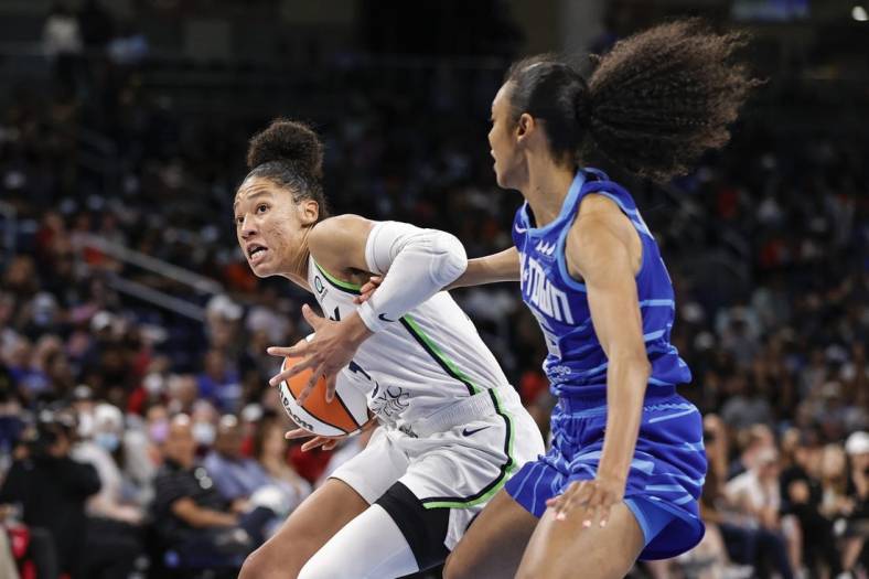 Jun 26, 2022; Chicago, Illinois, USA; Minnesota Lynx forward Aerial Powers (3) drives to the basket against Chicago Sky guard Rebekah Gardner (35) during the second half of a WNBA game at Wintrust Arena. Mandatory Credit: Kamil Krzaczynski-USA TODAY Sports