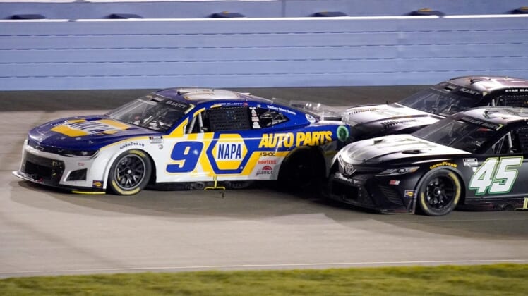 NASCAR Cup Series driver Chase Elliott (9) works past Kurt Busch (45) and Ryan Blaney (12) during the Ally 400 at the Nashville Superspeedway in Lebanon, Tenn., Sunday, June 26, 2022.Nascar 062622 An 049