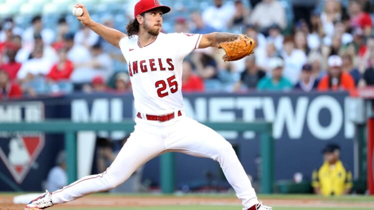 Jun 24, 2022; Anaheim, California, USA; Los Angeles Angels starting pitcher Michael Lorenzen (25) pitches during the game against the Seattle Mariners at Angel Stadium. Mandatory Credit: Kiyoshi Mio-USA TODAY Sports