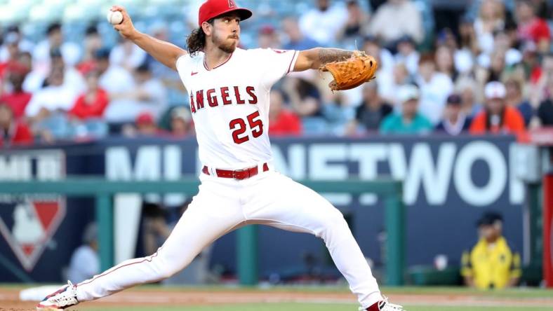 Jun 24, 2022; Anaheim, California, USA; Los Angeles Angels starting pitcher Michael Lorenzen (25) pitches during the game against the Seattle Mariners at Angel Stadium. Mandatory Credit: Kiyoshi Mio-USA TODAY Sports