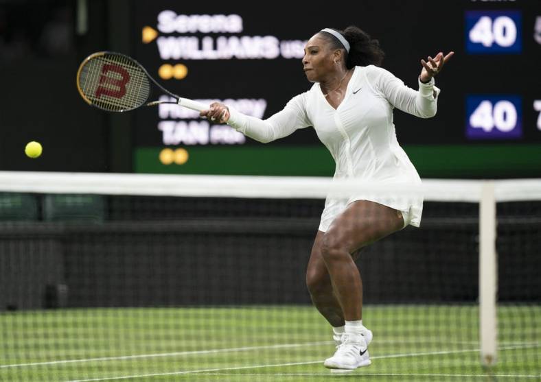 Jun 28, 2022; London, United Kingdom; Serena Williams (USA) returns a shot during her first round match against Harmony Tan (FRA) on day two at All England Lawn Tennis and Croquet Club. Mandatory Credit: Susan Mullane-USA TODAY Sports