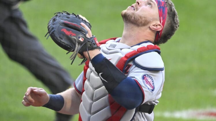 Jun 28, 2022; Cleveland, Ohio, USA; Minnesota Twins catcher Ryan Jeffers (27) looks for a foul ball in the second inning against the Cleveland Guardians at Progressive Field. Mandatory Credit: David Richard-USA TODAY Sports