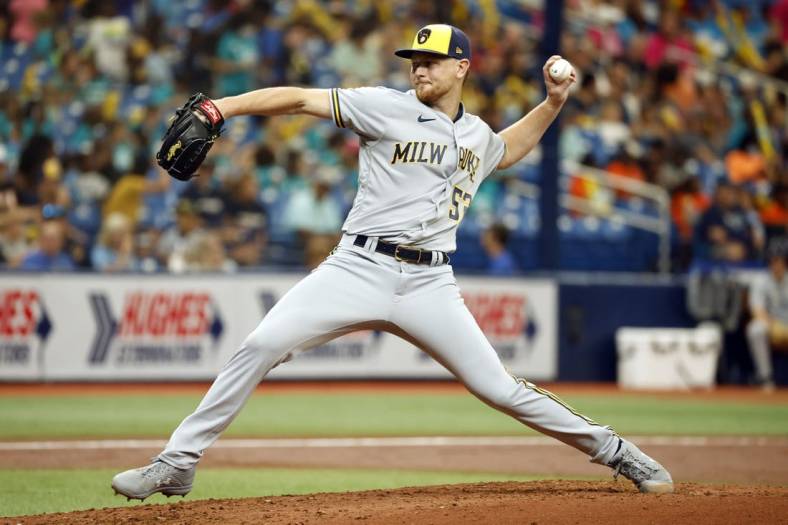 Jun 29, 2022; St. Petersburg, Florida, USA;  Milwaukee Brewers starting pitcher Eric Lauer (52) throws a pitch during the second inning against the Tampa Bay Rays at Tropicana Field. Mandatory Credit: Kim Klement-USA TODAY Sports