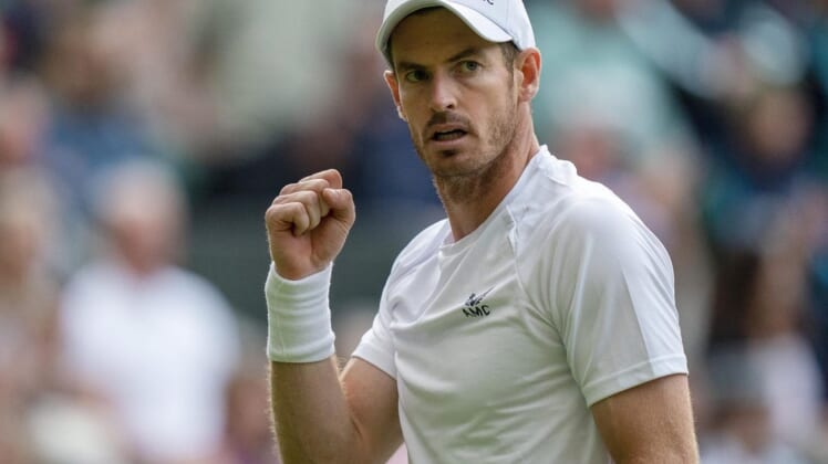 Jun 29, 2022; London, United Kingdom; Andy Murray (GBR) reacts to a point during his second round match against John Isner (USA) on day three at All England Lawn Tennis and Croquet Club. Mandatory Credit: Susan Mullane-USA TODAY Sports