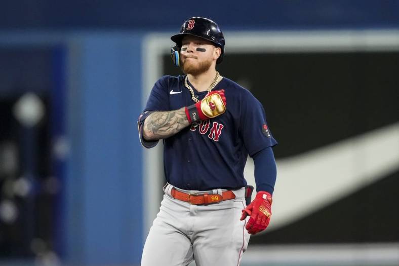 Jun 29, 2022; Toronto, Ontario, CAN; Boston Red Sox left fielder Alex Verdugo (99) celebrates after hitting a double during the tenth inning against the Toronto Blue Jays at Rogers Centre. Mandatory Credit: Kevin Sousa-USA TODAY Sports