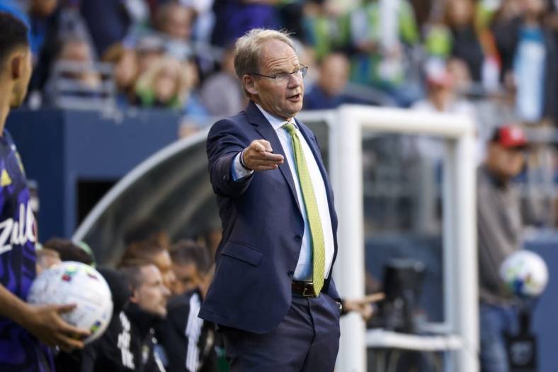 Jun 29, 2022; Seattle, Washington, USA; Seattle Sounders FC head coach Brian Schmetzer reacts to a referees call for CF Montreal during the second half at Lumen Field. Mandatory Credit: Joe Nicholson-USA TODAY Sports