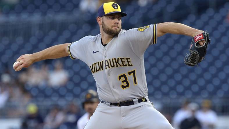 Jun 30, 2022; Pittsburgh, Pennsylvania, USA; Milwaukee Brewers starting pitcher Adrian Houser (37) throws a pitch against the Pittsburgh Pirates during the first inning at PNC Park. Mandatory Credit: Charles LeClaire-USA TODAY Sports