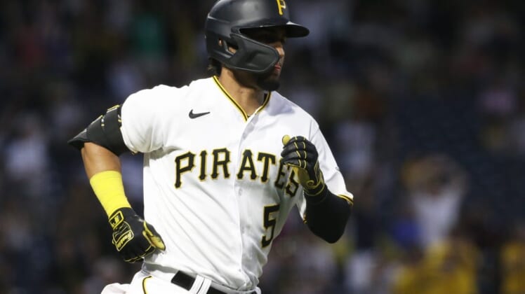 Jun 30, 2022; Pittsburgh, Pennsylvania, USA; Pittsburgh Pirates catcher Michael Perez (5) rounds the bases after hitting a two-run home run against the Milwaukee Brewers during the sixth inning at PNC Park. Mandatory Credit: Charles LeClaire-USA TODAY Sports