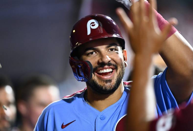 Jun 30, 2022; Philadelphia, Pennsylvania, USA; Philadelphia Phillies first baseman Darick Hall (25) celebrates in the dugout after hitting a two-run home run against the Atlanta Braves in the eighth inning at Citizens Bank Park. Mandatory Credit: Kyle Ross-USA TODAY Sports