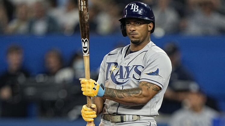 Jun 30, 2022; Toronto, Ontario, CAN; Tampa Bay Rays shortstop Wander Franco (5) looks at his bat during during the seventh inning against the Toronto Blue Jays at Rogers Centre. Mandatory Credit: John E. Sokolowski-USA TODAY Sports