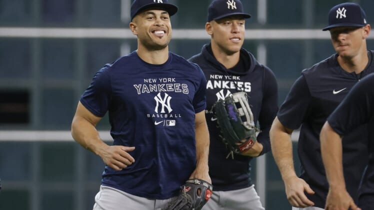 Jun 30, 2022; Houston, Texas, USA; New York Yankees left fielder Giancarlo Stanton (27) smiles before the game against the Houston Astros at Minute Maid Park. Mandatory Credit: Troy Taormina-USA TODAY Sports