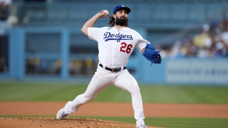 Jul 1, 2022; Los Angeles, California, USA; Los Angeles Dodgers' Tony Gonsolin (26) delivers a pitch in the third inning against the San Diego Padres at Dodger Stadium. Mandatory Credit: Kirby Lee-USA TODAY Sports