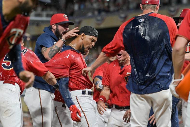 Jul 1, 2022; Minneapolis, Minnesota, USA; Minnesota Twins center fielder Byron Buxton (25) reacts after hitting a two-run walk-off home run against Baltimore Orioles relief pitcher Jorge Lopez (not pictured) during the ninth inning at Target Field. Mandatory Credit: Jeffrey Becker-USA TODAY Sports