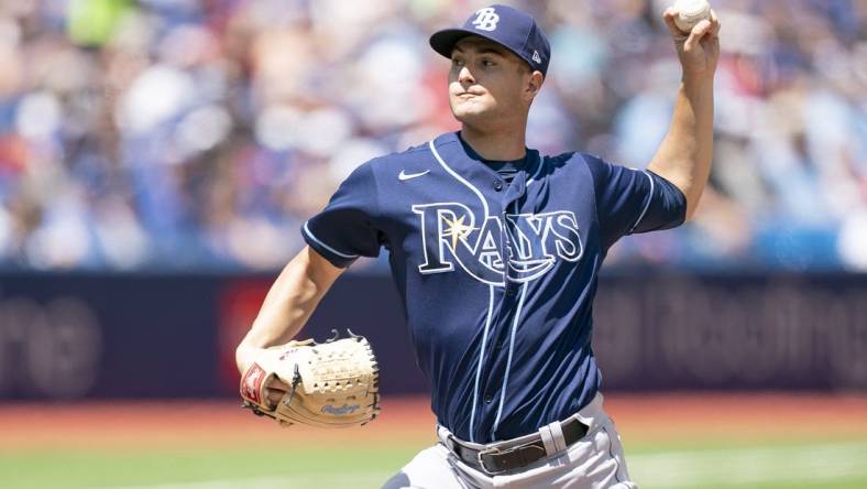 Jul 2, 2022; Toronto, Ontario, CAN; Tampa Bay Rays starting pitcher Shane McClanahan (18) throws a pitch against the Toronto Blue Jays during the first inning at Rogers Centre. Mandatory Credit: Nick Turchiaro-USA TODAY Sports