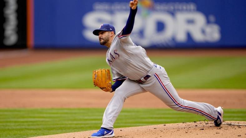 Jul 2, 2022; New York City, New York, USA; Texas Rangers pitcher Martin Perez (54) delivers a pitch against the New York Mets during the first inning at Citi Field. Mandatory Credit: Gregory Fisher-USA TODAY Sports