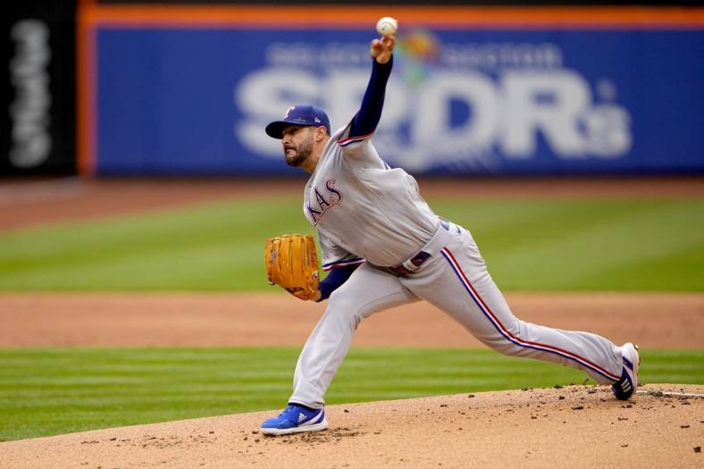 Jul 2, 2022; New York City, New York, USA; Texas Rangers pitcher Martin Perez (54) delivers a pitch against the New York Mets during the first inning at Citi Field. Mandatory Credit: Gregory Fisher-USA TODAY Sports