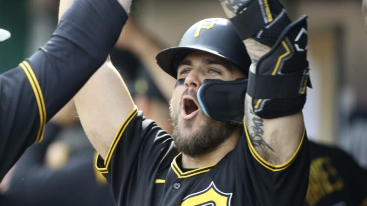 Jul 2, 2022; Pittsburgh, Pennsylvania, USA;  Pittsburgh Pirates first baseman Michael Chavis (2) celebrates his  two-run home run in the dugout against the Milwaukee Brewers during the third inning at PNC Park. Mandatory Credit: Charles LeClaire-USA TODAY Sports