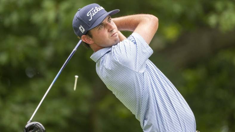 Jul 2, 2022; Silvis, Illinois, USA; J.T. Poston hits his tee shot on the 2nd hole during the third round of the John Deere Classic golf tournament. Mandatory Credit: Marc Lebryk-USA TODAY Sports