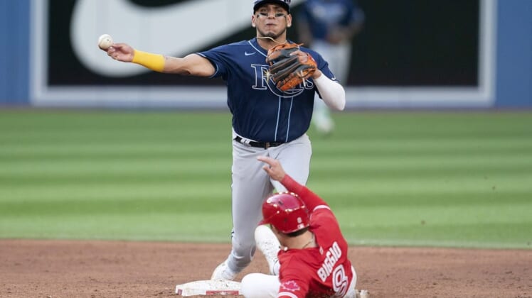 Jul 2, 2022; Toronto, Ontario, CAN; Tampa Bay Rays second baseman Isaac Paredes (17) forces out Toronto Blue Jays second baseman Cavan Biggio (8) at second base during the third inning at Rogers Centre. Mandatory Credit: Nick Turchiaro-USA TODAY Sports