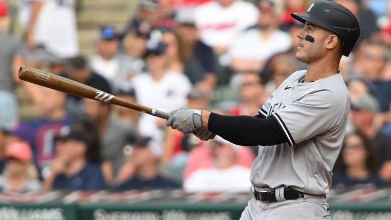 Jul 2, 2022; Cleveland, Ohio, USA; New York Yankees first baseman Anthony Rizzo (48) hits a home run during the fourth inning against the Cleveland Guardians at Progressive Field. Mandatory Credit: Ken Blaze-USA TODAY Sports