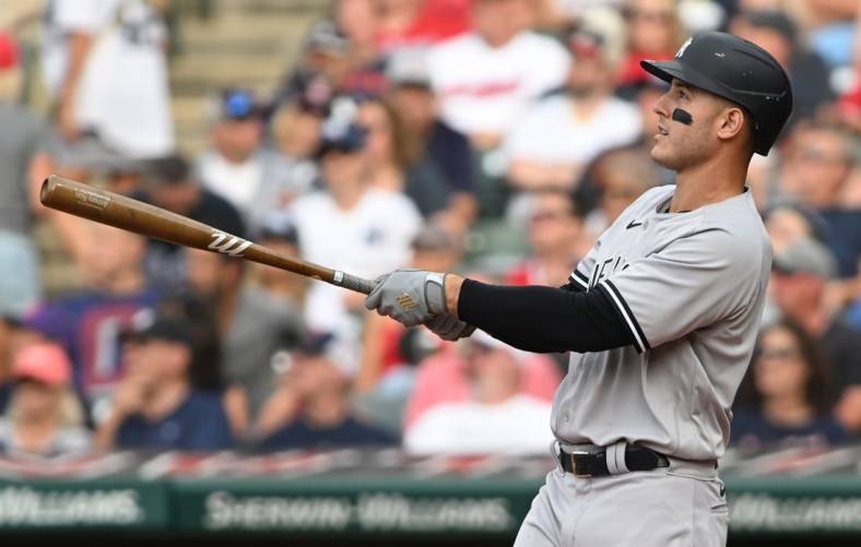 Jul 2, 2022; Cleveland, Ohio, USA; New York Yankees first baseman Anthony Rizzo (48) hits a home run during the fourth inning against the Cleveland Guardians at Progressive Field. Mandatory Credit: Ken Blaze-USA TODAY Sports