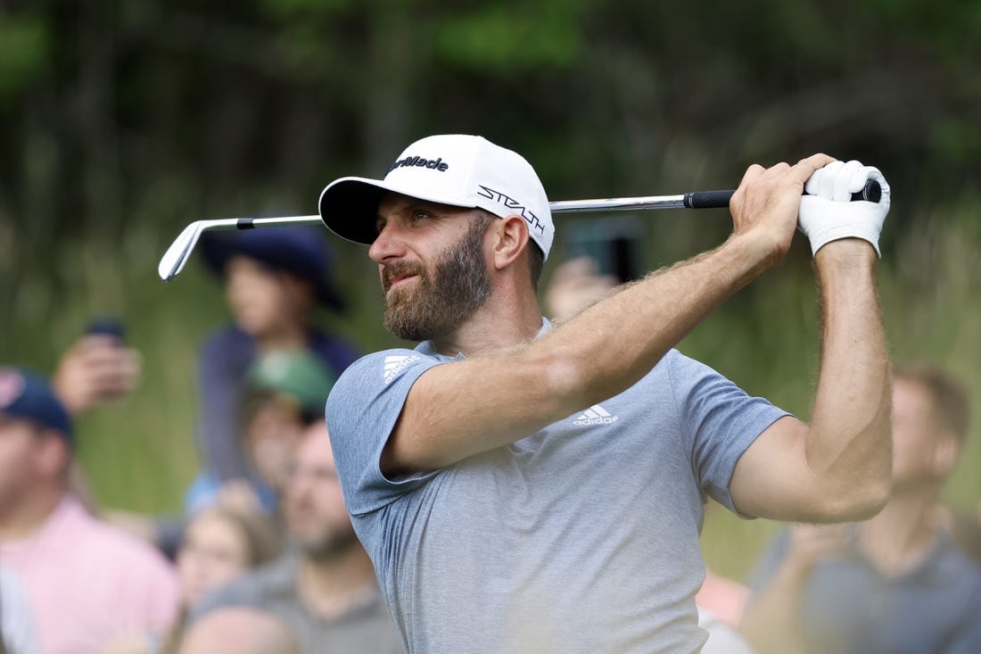 Jul 2, 2022; Portland, Oregon, USA; Dustin Johnson plays his shot from the 15th tee during the final round of the LIV Golf tournament at Pumpkin Ridge Golf Club. Mandatory Credit: Soobum Im-USA TODAY Sports