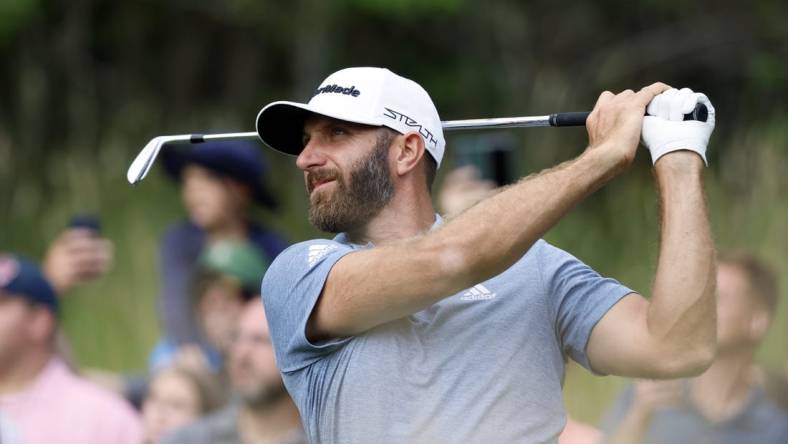 Jul 2, 2022; Portland, Oregon, USA; Dustin Johnson plays his shot from the 15th tee during the final round of the LIV Golf tournament at Pumpkin Ridge Golf Club. Mandatory Credit: Soobum Im-USA TODAY Sports