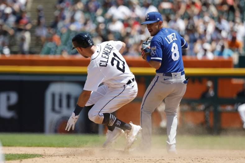 Jul 3, 2022; Detroit, Michigan, USA;  Detroit Tigers second baseman Kody Clemens (21) slides in safe at second in front of Kansas City Royals second baseman Nicky Lopez (8) during the fifth inning at Comerica Park. Mandatory Credit: Rick Osentoski-USA TODAY Sports