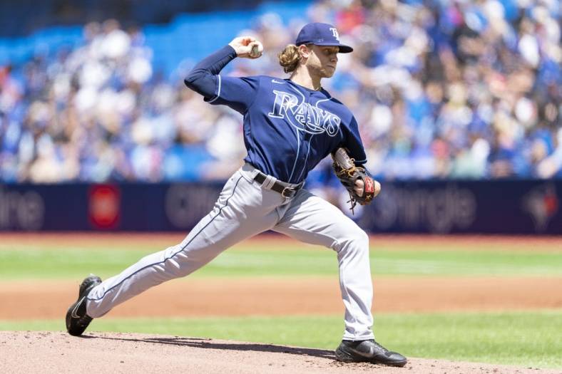 Jul 3, 2022; Toronto, Ontario, CAN; Tampa Bay Rays starting pitcher Shane Baz (11) delivers a pitch against the Toronto Blue Jays during the first inning at Rogers Centre. Mandatory Credit: Kevin Sousa-USA TODAY Sports