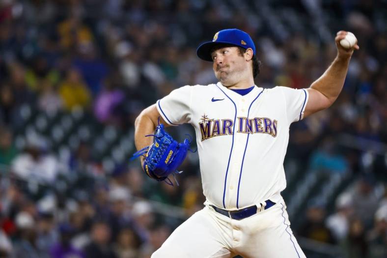 Jul 3, 2022; Seattle, Washington, USA; Seattle Mariners starting pitcher Robbie Ray (38) throws against the Oakland Athletics during the seventh inning at T-Mobile Park. Mandatory Credit: Joe Nicholson-USA TODAY Sports