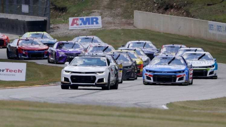 The pace car leads the cars during a caution flag during the NASCAR Kwik Trip 250, Sunday, July 3, 2022, at Elkhart Lake's Road America near Elkhart Lake, Wis.