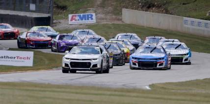 The pace car leads the cars during a caution flag during the NASCAR Kwik Trip 250, Sunday, July 3, 2022, at Elkhart Lake's Road America near Elkhart Lake, Wis.