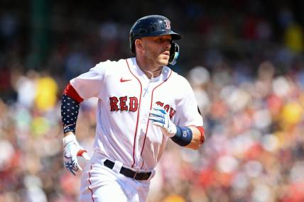 Jul 4, 2022; Boston, Massachusetts, USA; Boston Red Sox second baseman Trevor Story (10) runs the bases after hitting a solo home run against the Tampa Bay Rays during the fourth inning at Fenway Park. Mandatory Credit: Brian Fluharty-USA TODAY Sports