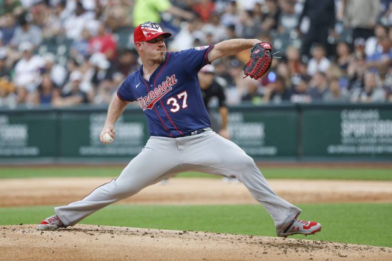 Jul 4, 2022; Chicago, Illinois, USA; Minnesota Twins starting pitcher Dylan Bundy (37) delivers against the Chicago White Sox during the first inning at Guaranteed Rate Field. Mandatory Credit: Kamil Krzaczynski-USA TODAY Sports
